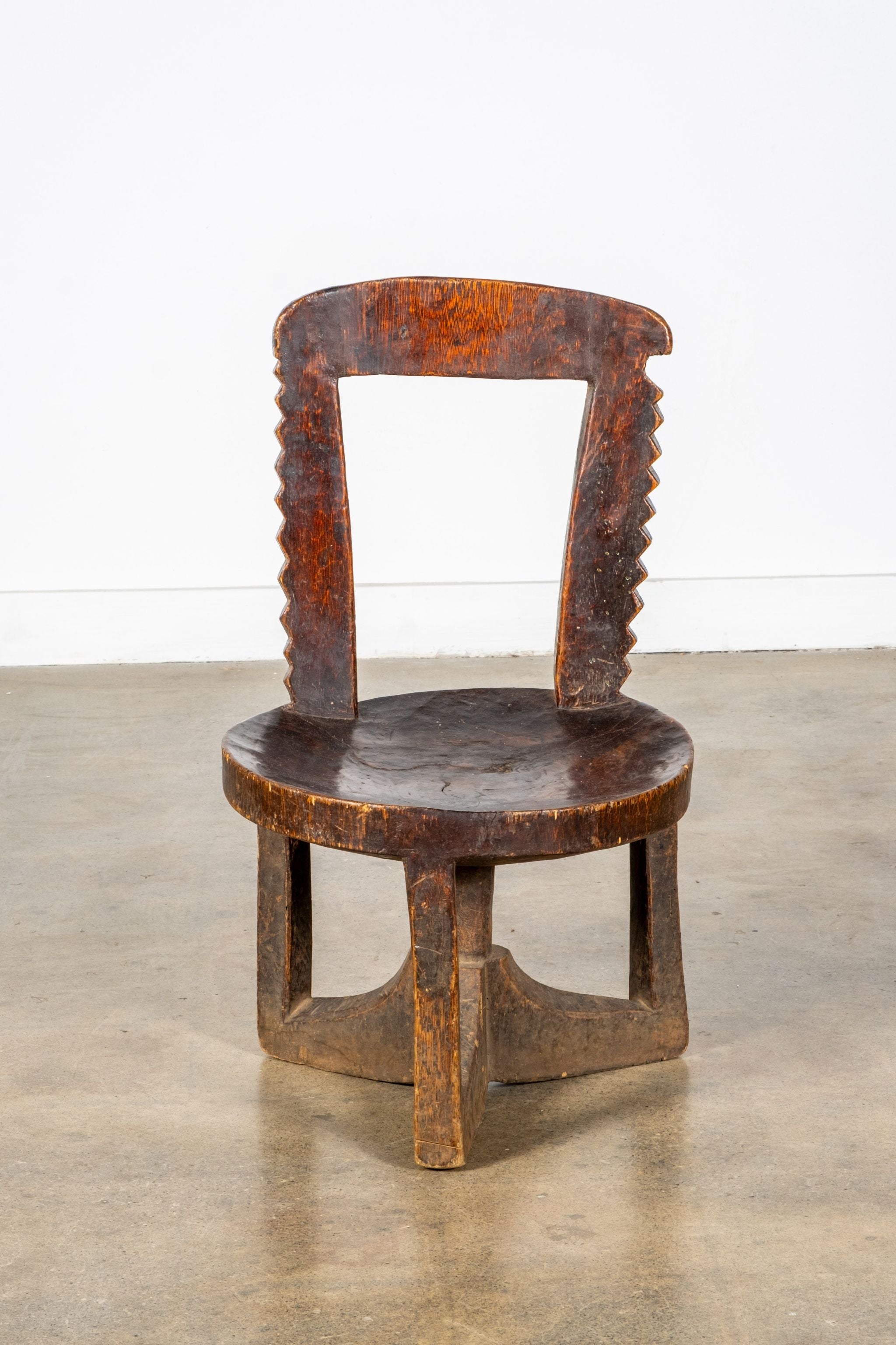 3-legged African Wood Chair with Scalloped Back