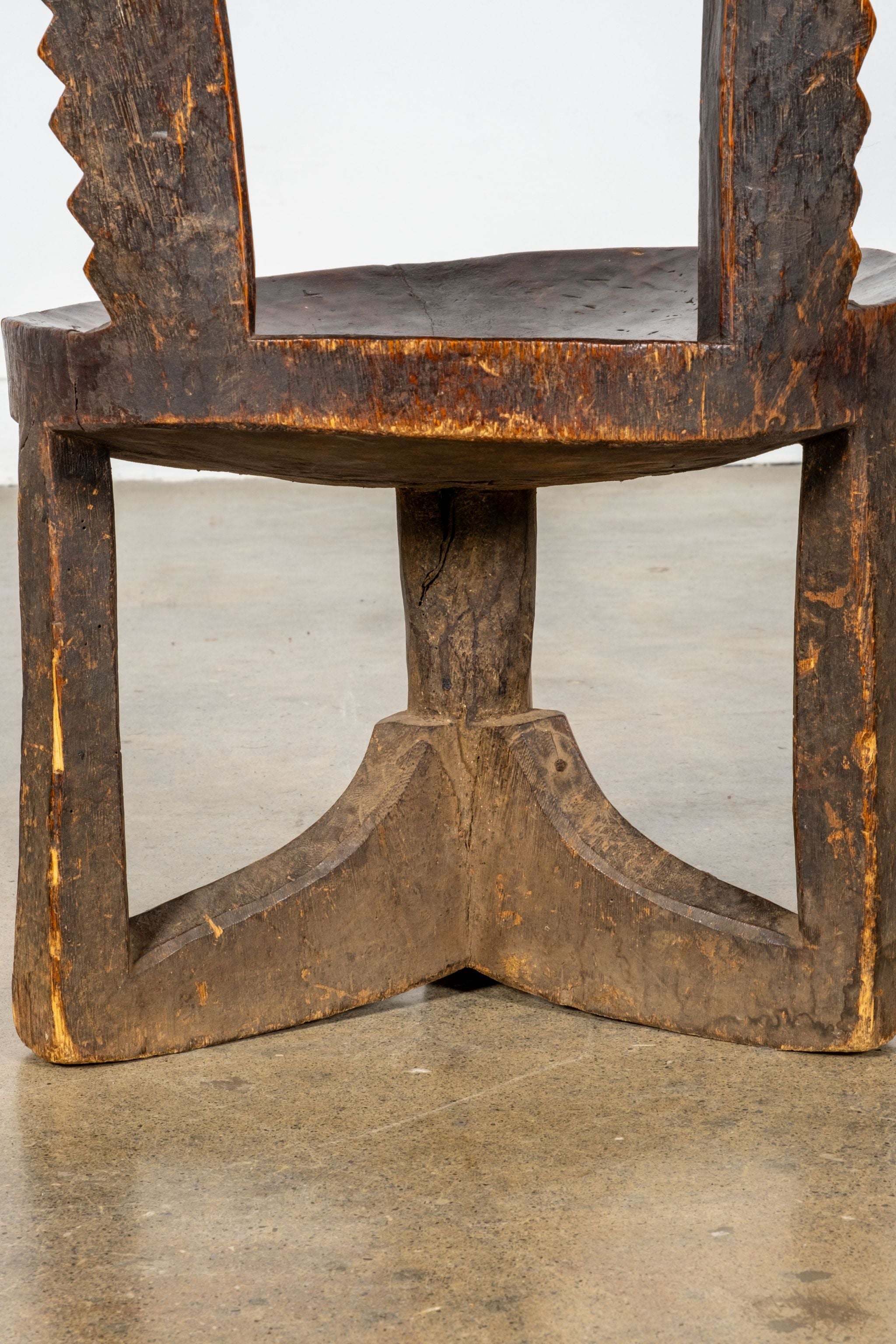 3-legged African Wood Chair with Scalloped Back