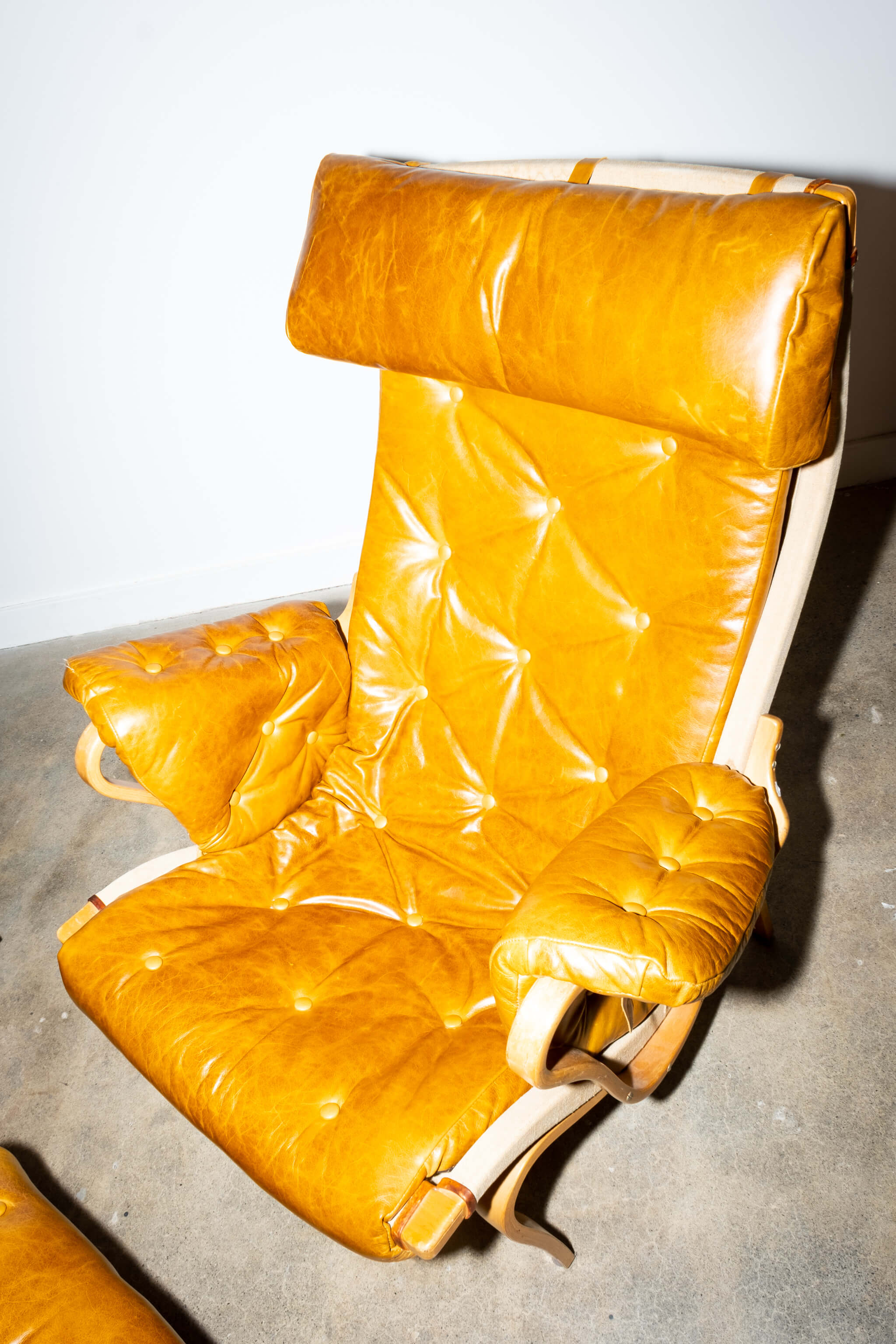 Pernilla 69' Leather and Beech Chair and Ottoman