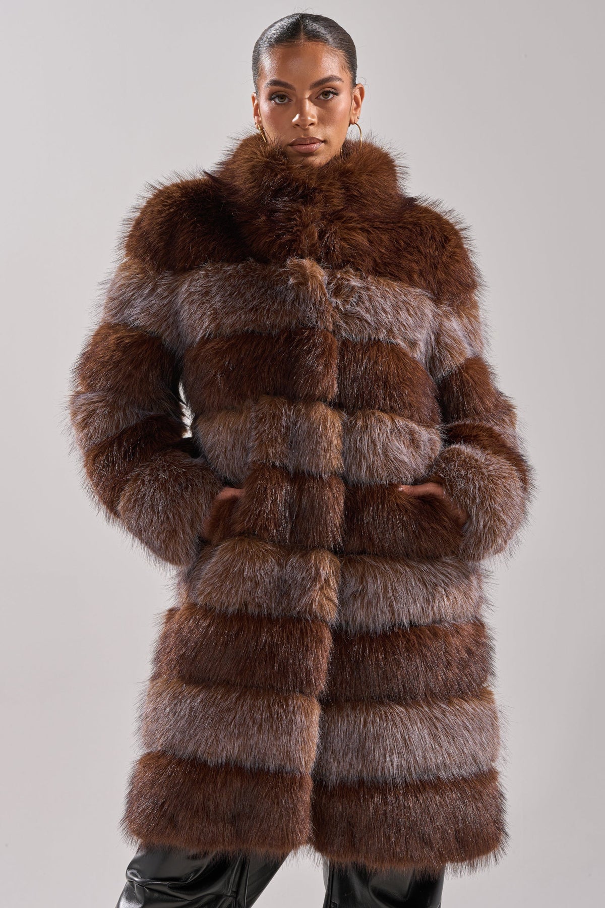 LITTLE BIT OF SPICE PANELED FAUX FUR COAT