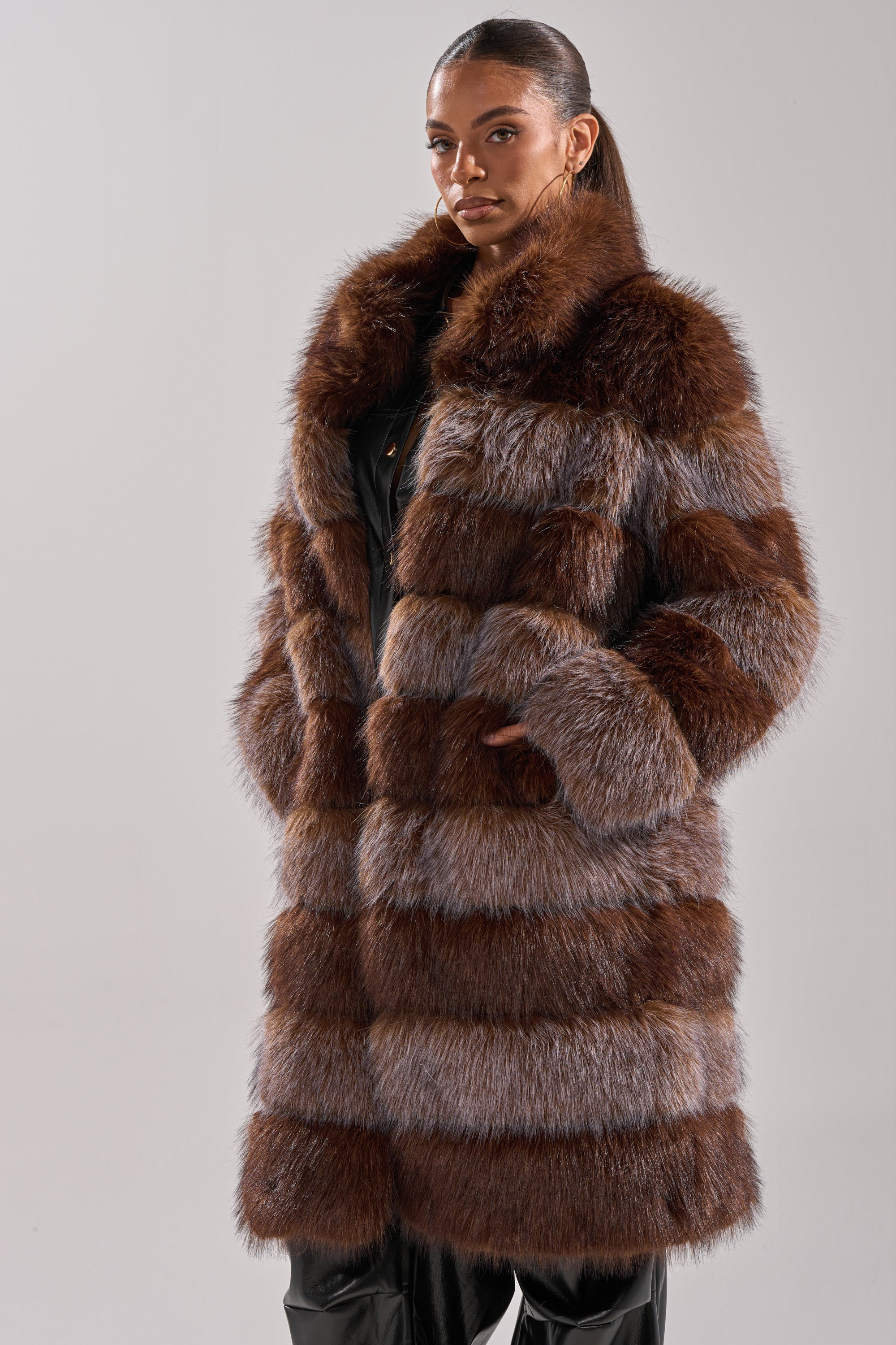 LITTLE BIT OF SPICE PANELED FAUX FUR COAT