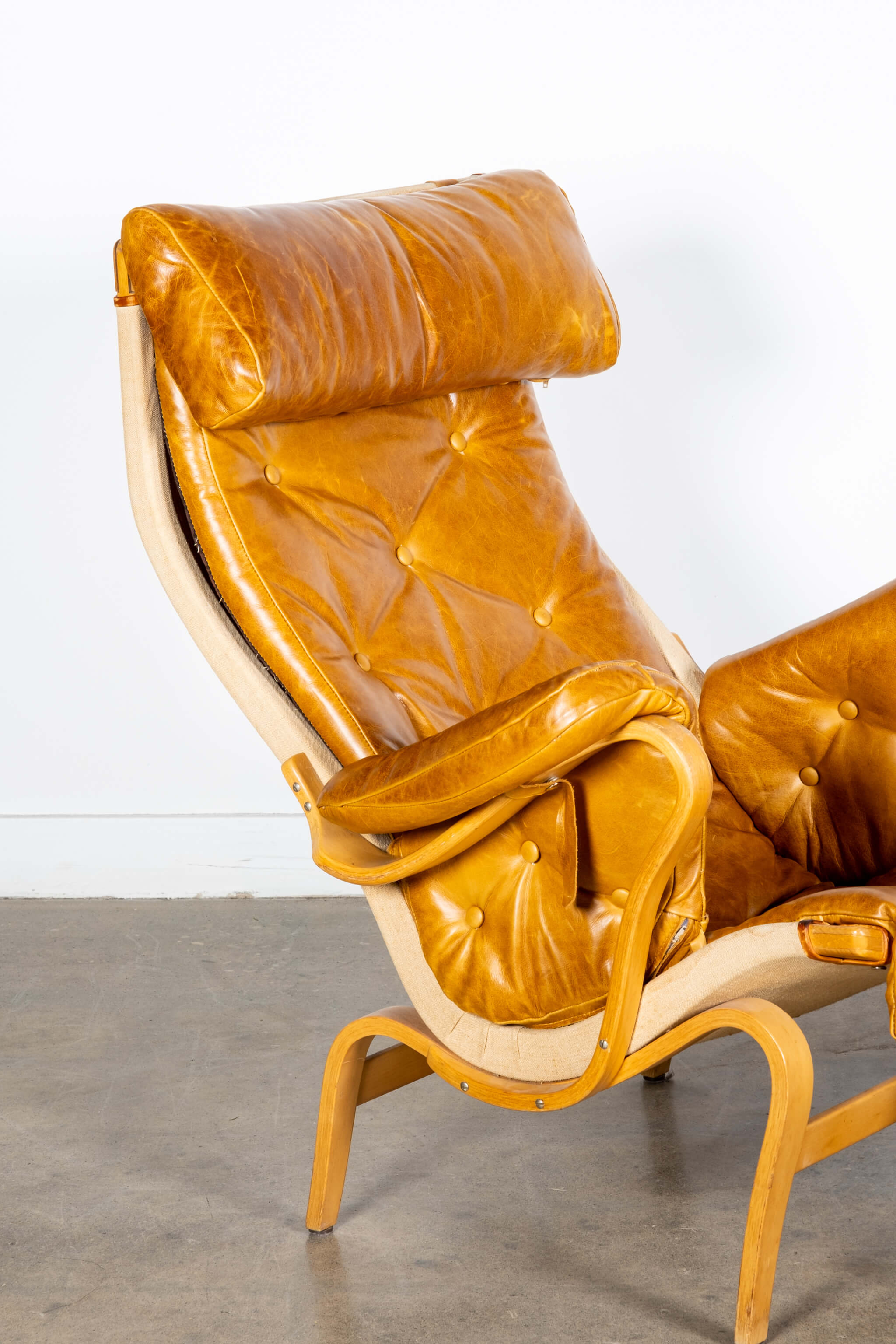 Pernilla 69' Leather and Beech Chair and Ottoman