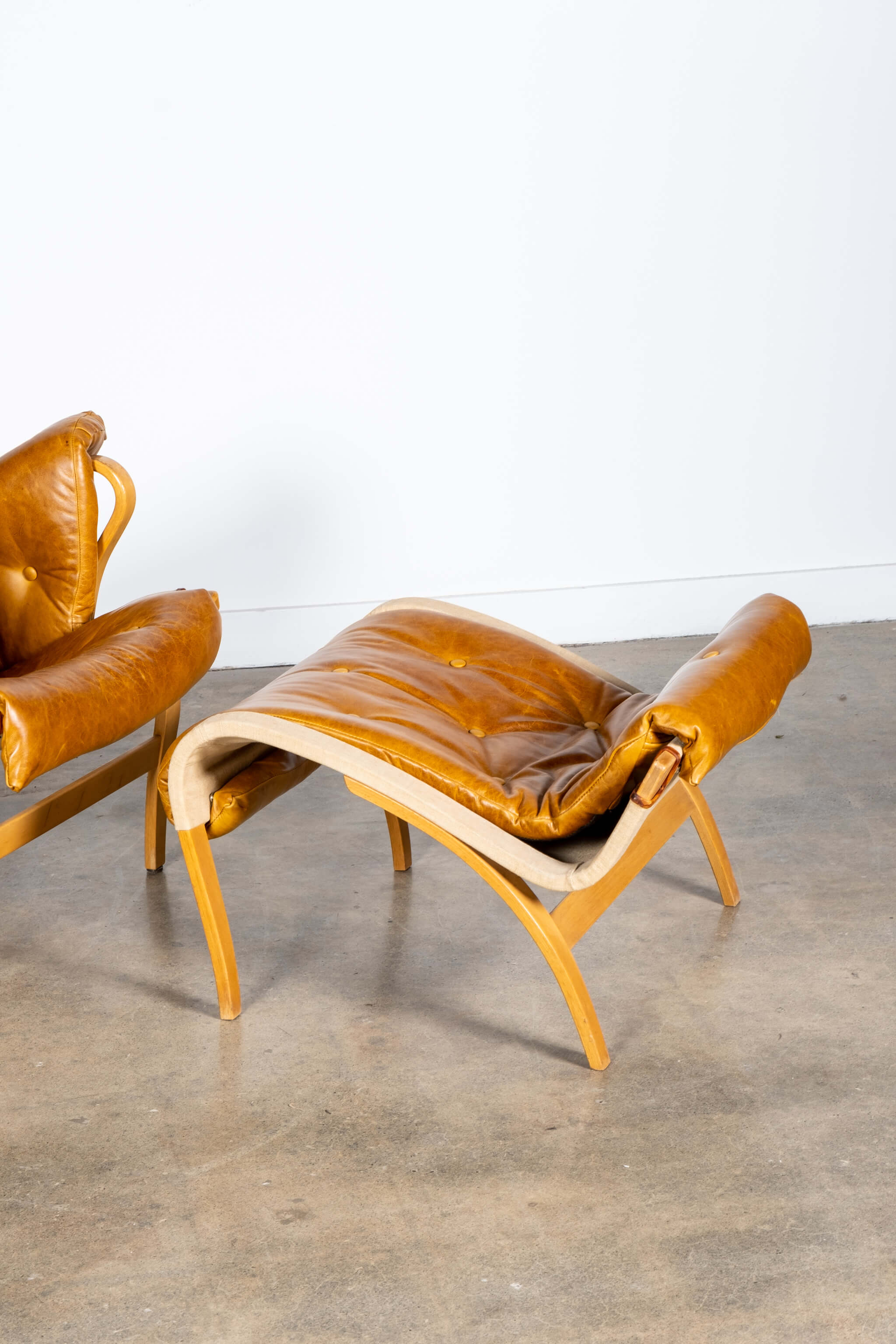 Pernilla 69' Leather and Beech Chair and Ottoman