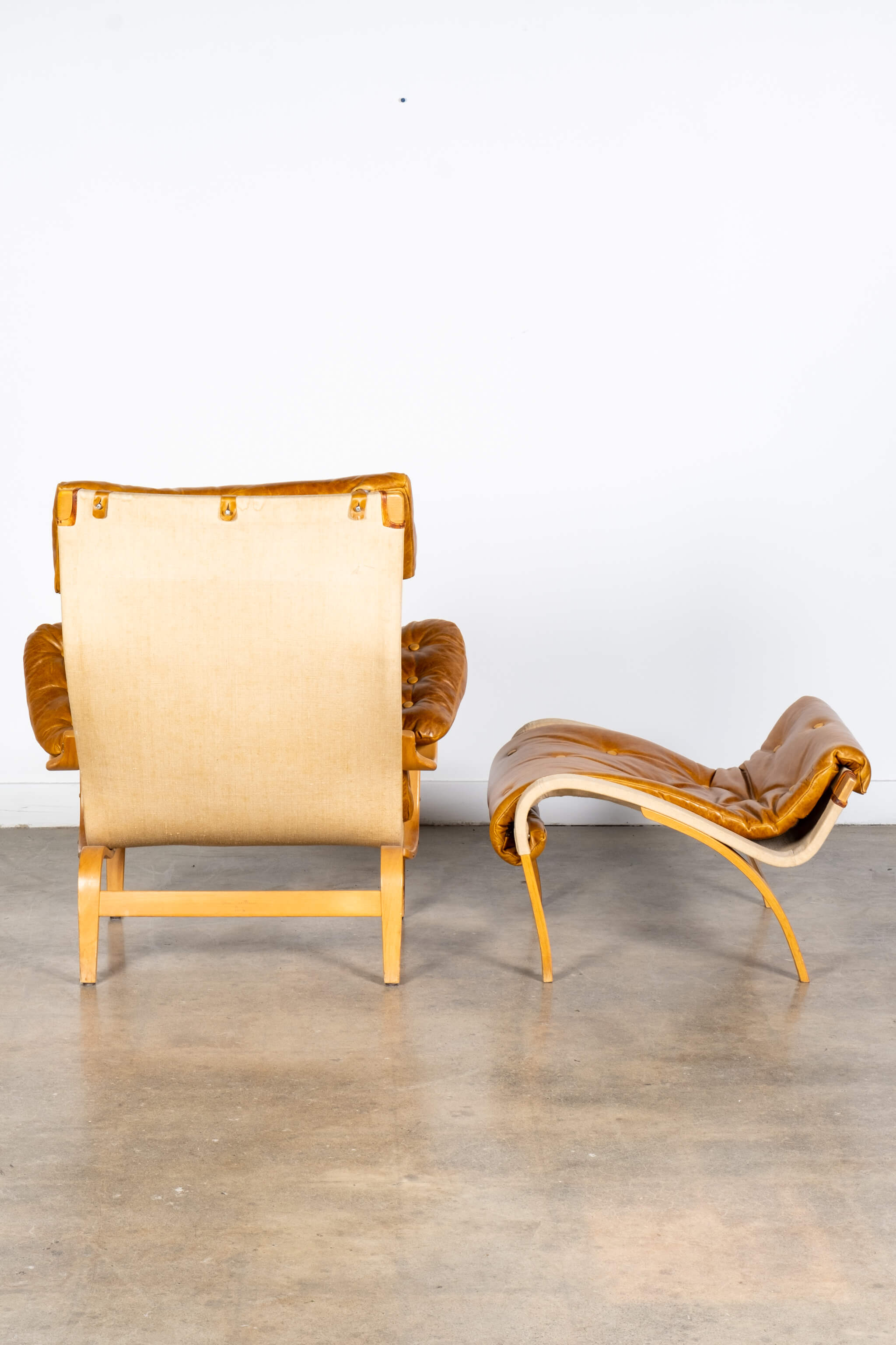 Pernilla 69' Leather and Beech Chair and Ottoman
